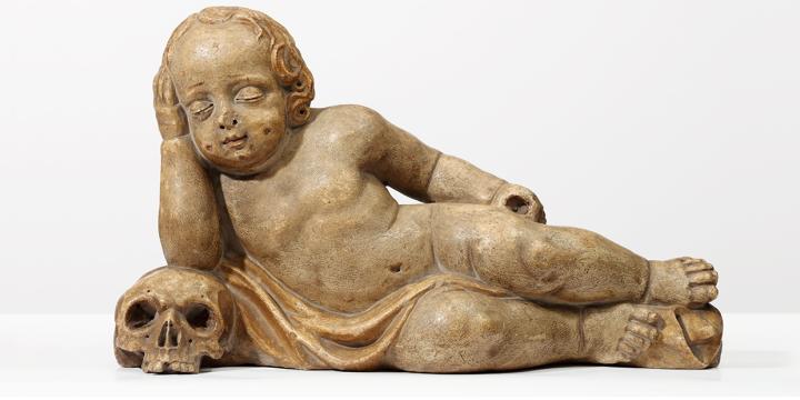 Koponyán alvó gyermek, zsírkő szobor
