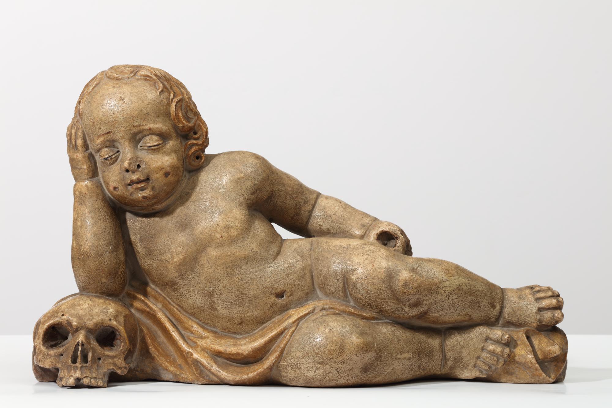 Koponyán alvó gyermek, zsírkő szobor 