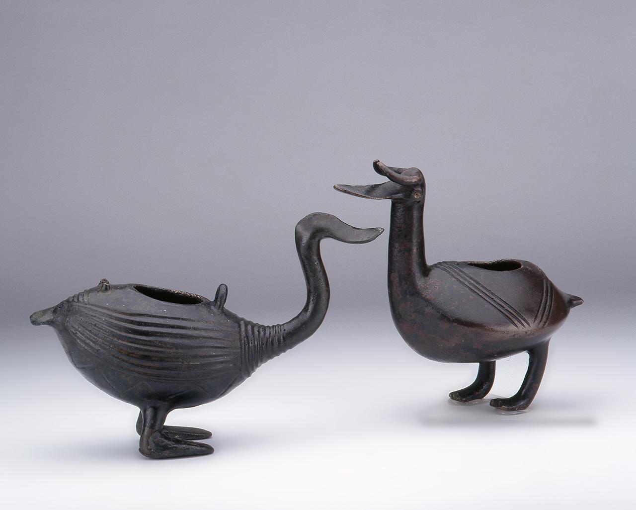 Bird-shaped grease lanterns.