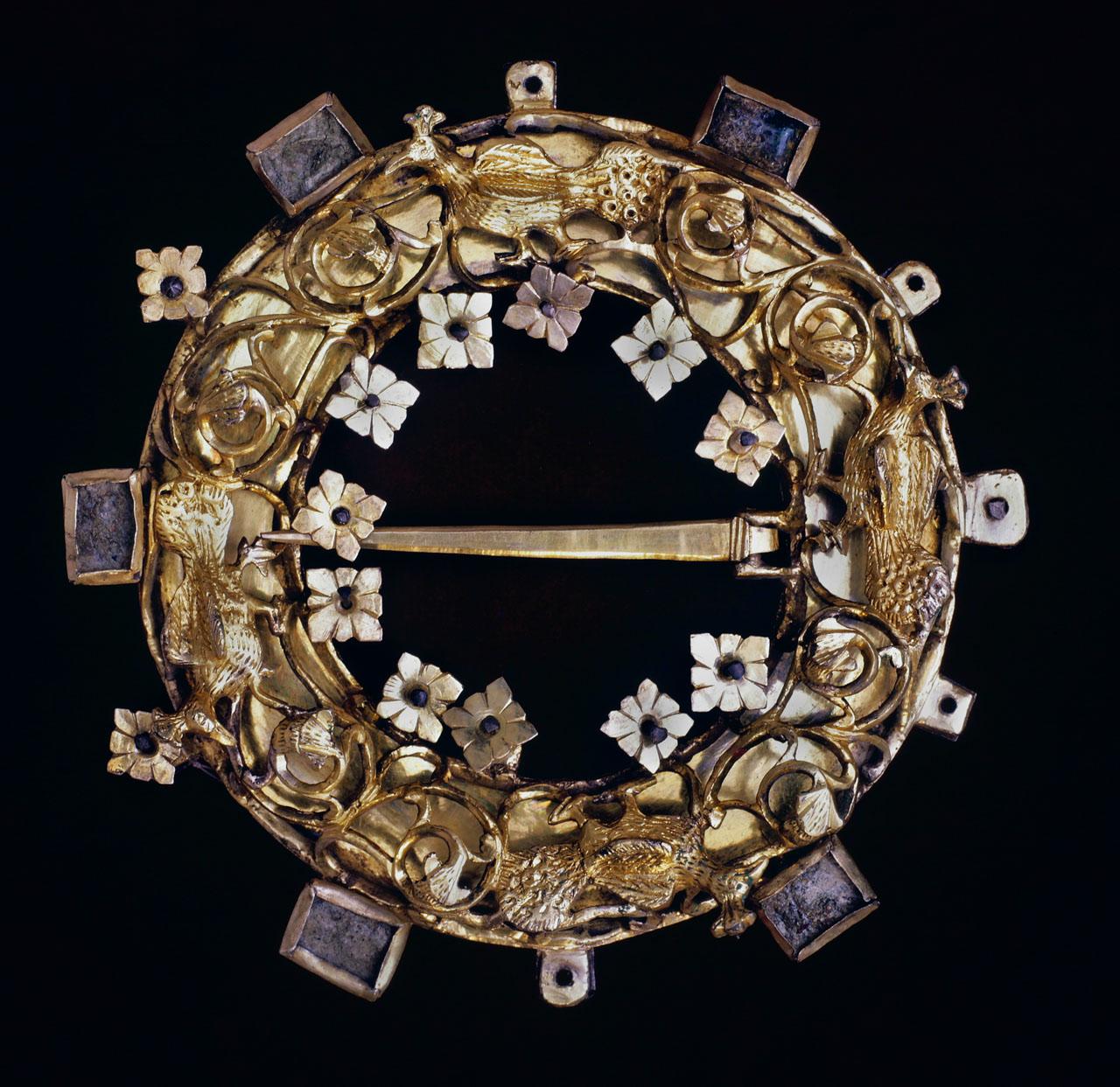 Cloak clasp with peacocks.