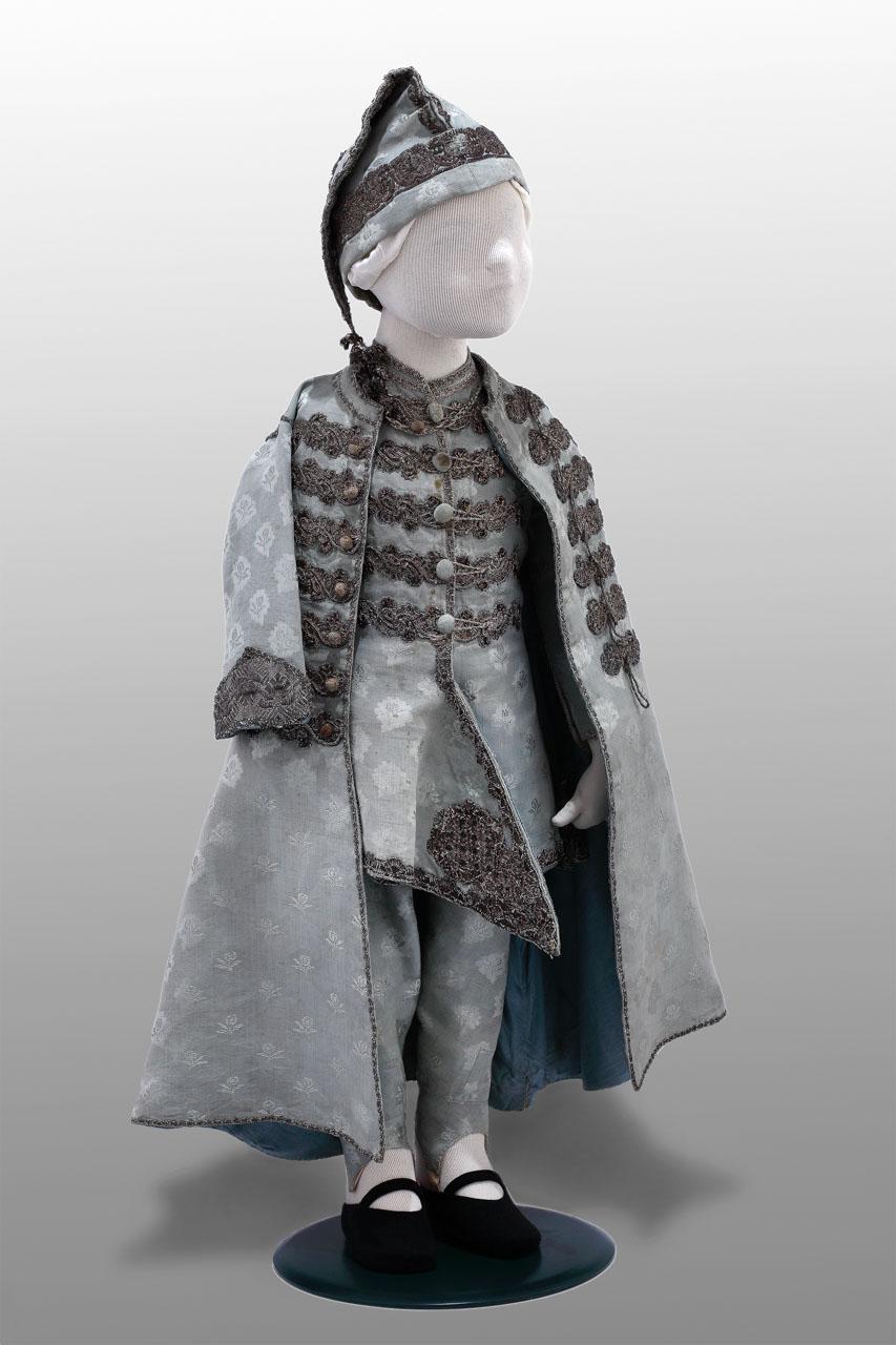Ceremonial attire for a young boy.