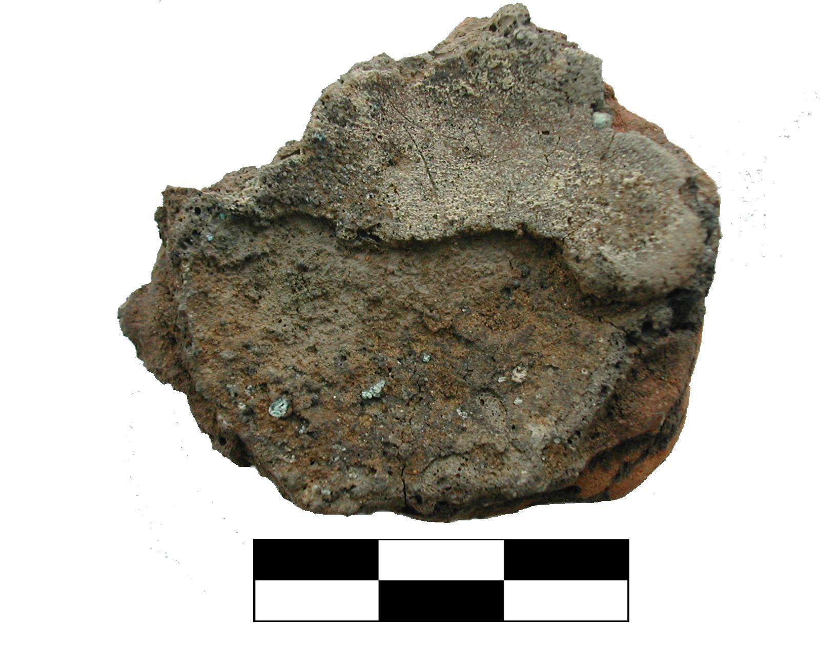 Az őskori bronzöntés titka_Öntőtégely olvadt belső felülete bronz olvadékokkal