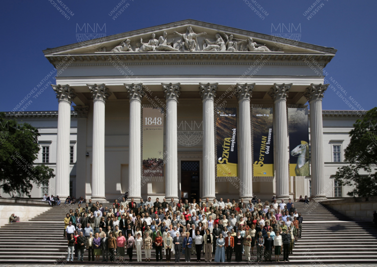 The facade of the Hungarian National Museum, with the staff of the institution standing on its stairway. 2009