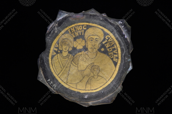 GLASS DRINKING VESSEL FROM DUNASZEKCSŐ DECORATED WITH AN EARLY CHRISTIAN SCENE