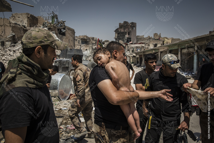 The Battle for Mosul - Young Boy Is Cared for by Iraqi Special Forces Soldiers